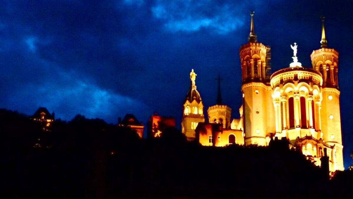 Luminous outline of the Fourvière hill above Lyon, night photo