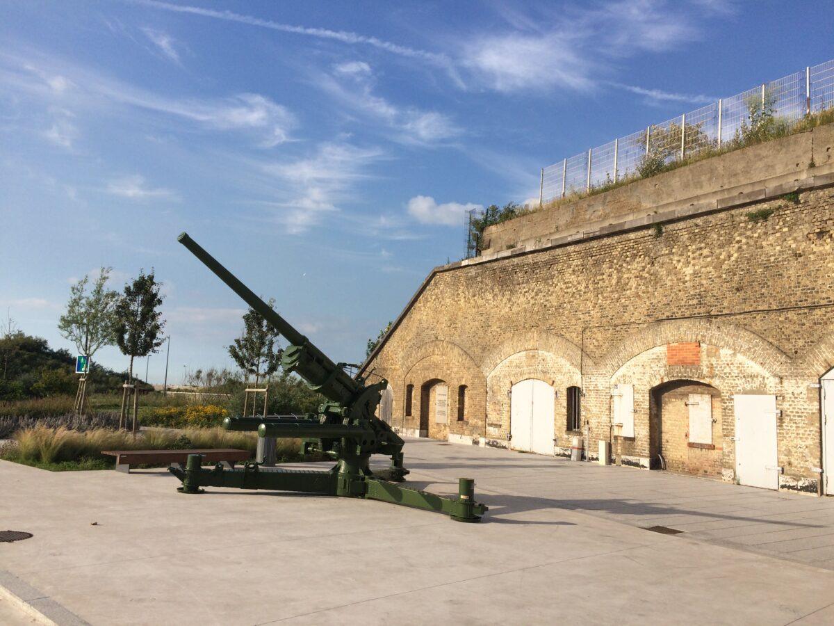 Brick facade of Bastion 32, Dunkirk 1940 Operation Dynamo museum, with artillery piece