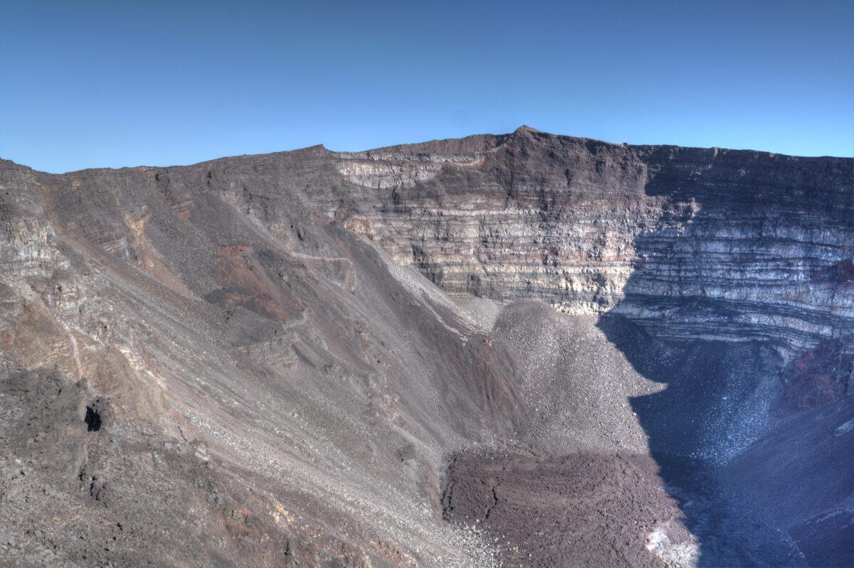 Réunion: Dolomieu crater at Piton de la Fournaise, volcanic ramparts and blue sky