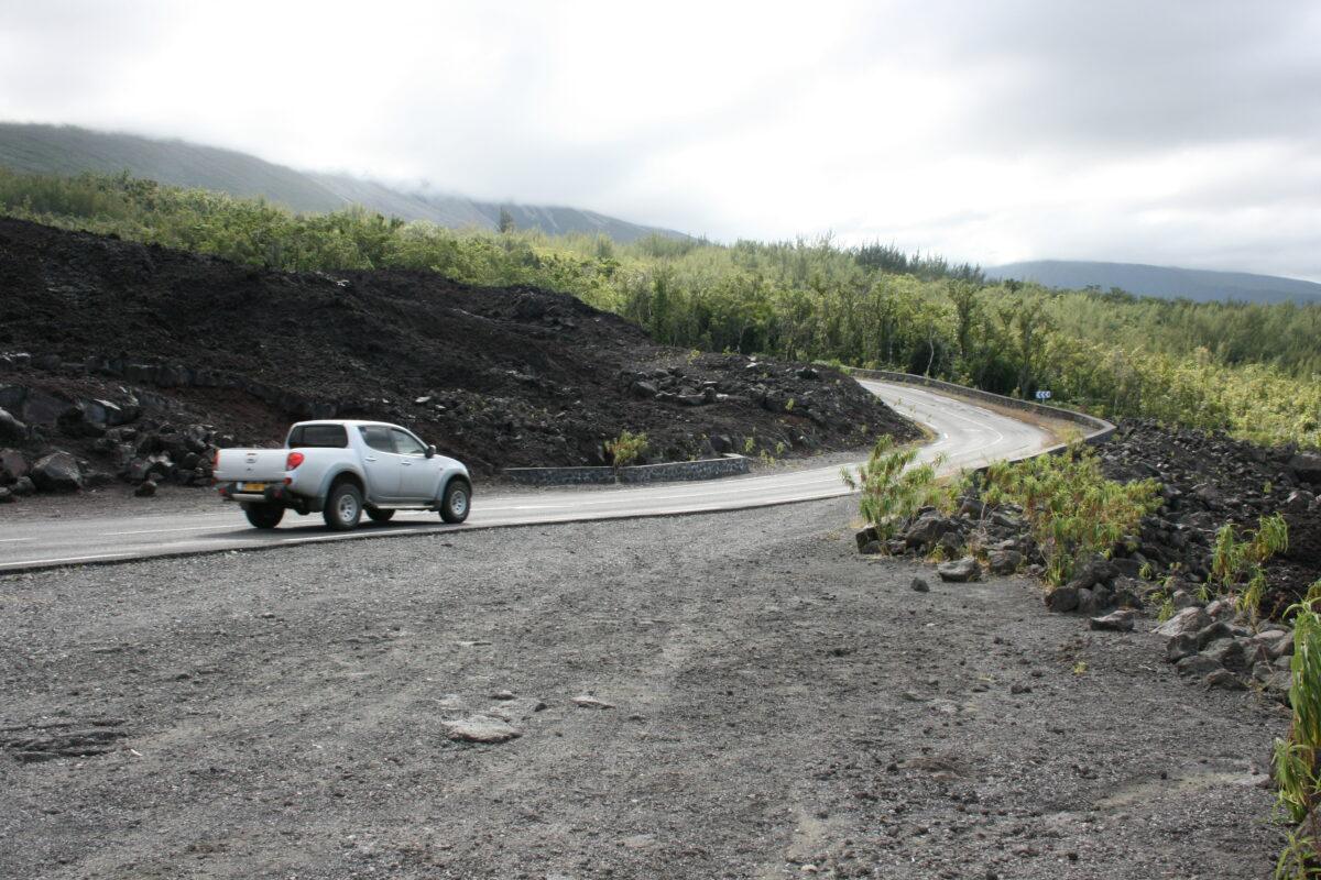 Route des Laves: road ribbon crossing old lava flows at the foot of the volcano