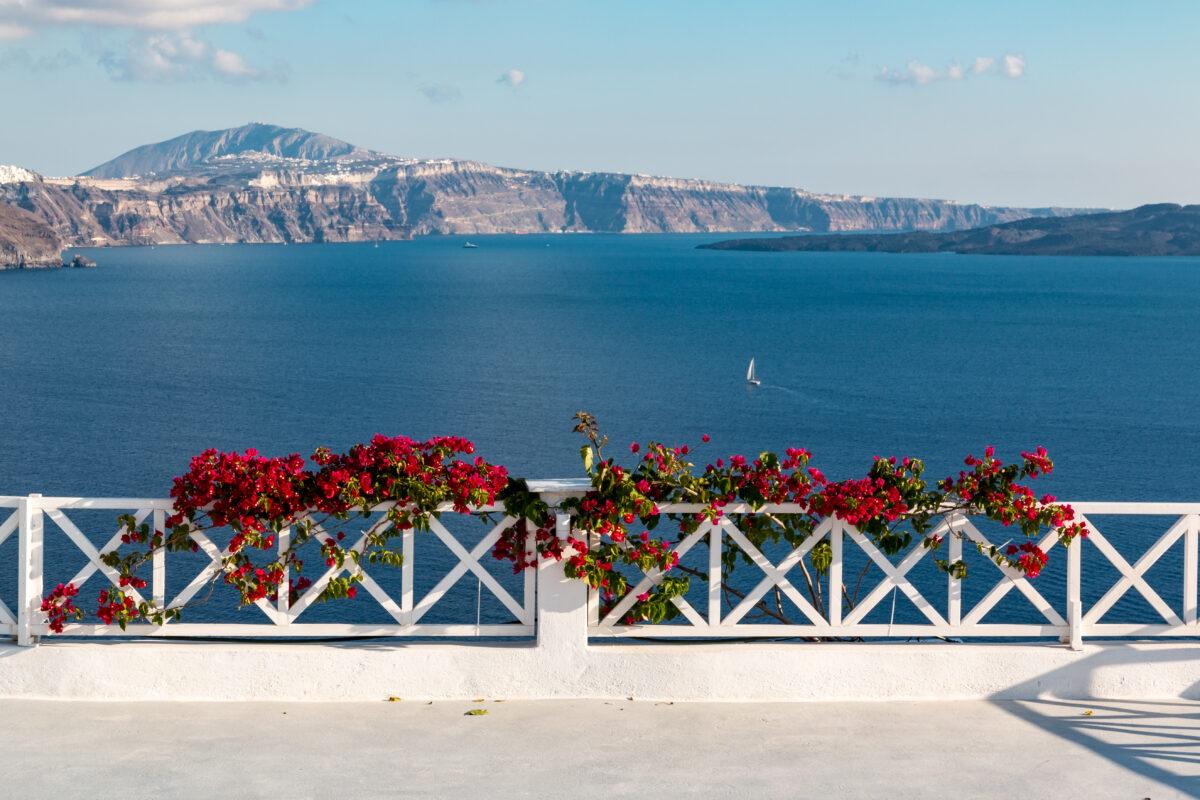 Santorini: panorama of Oia above the caldera, white facades and Aegean Sea