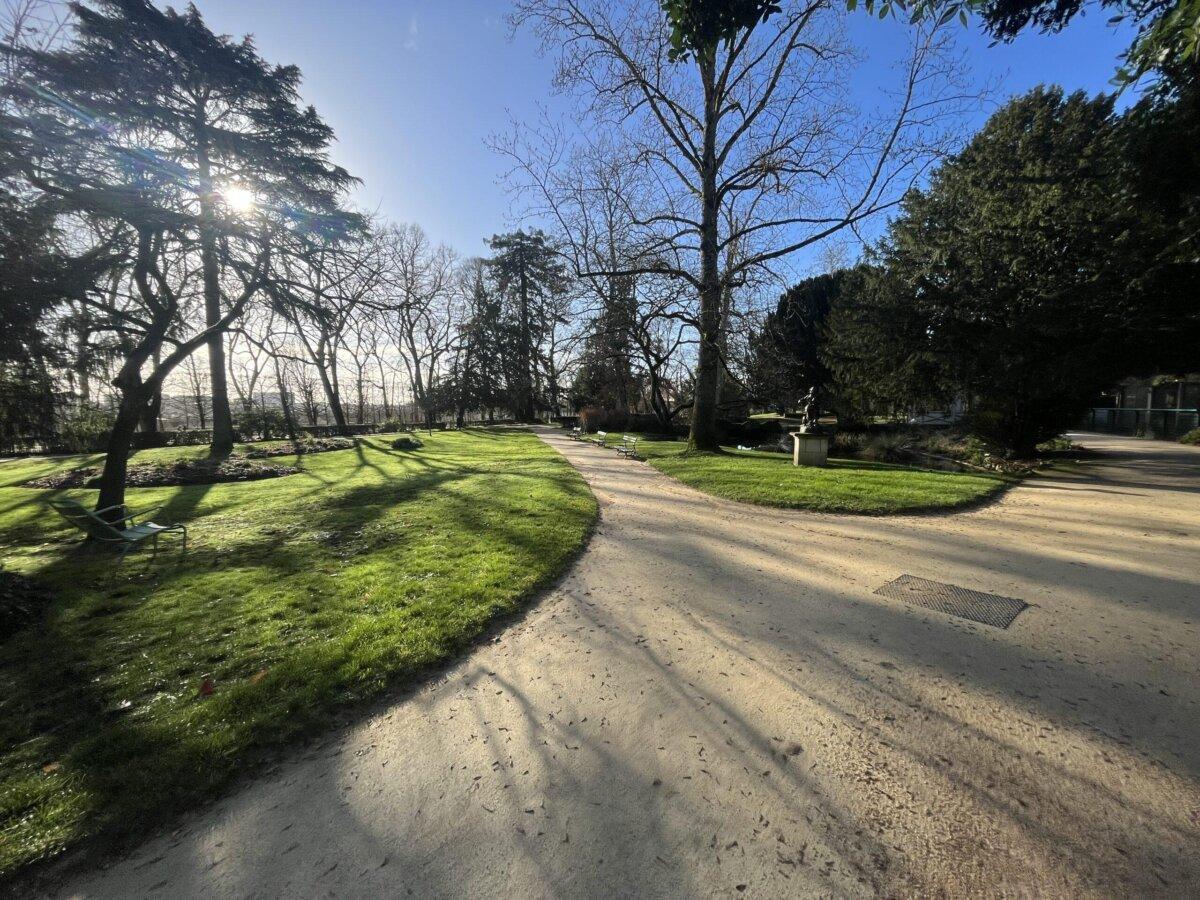 Paths and lawns of Parc de Blossac in Poitiers, winter light