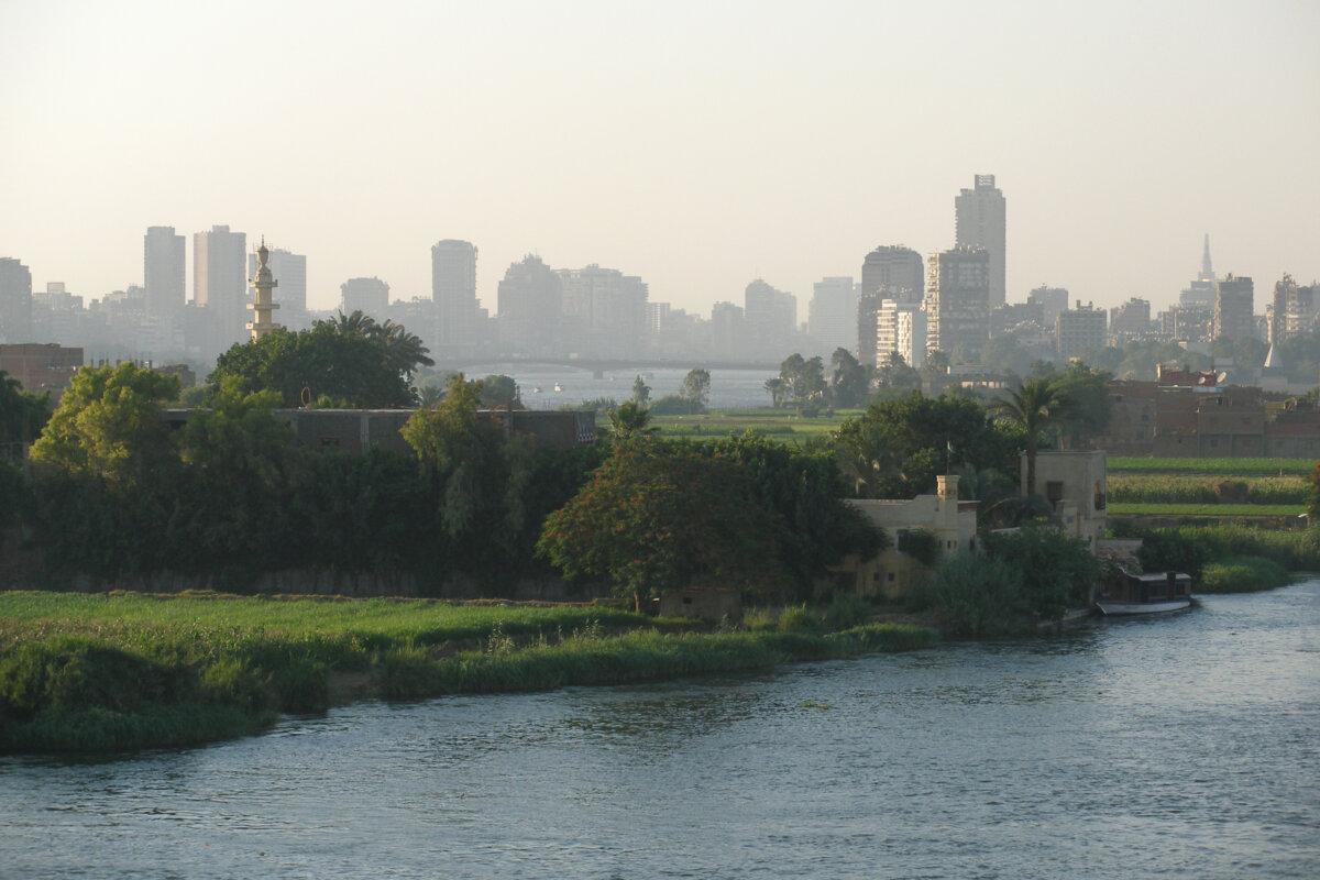 View of the Nile and the silhouette of Cairo at sunset