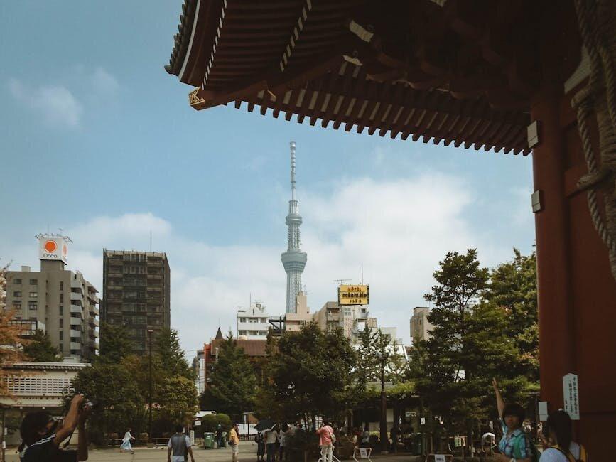Tokyo Skytree framed by the architecture of the Senso-ji temple in Asakusa