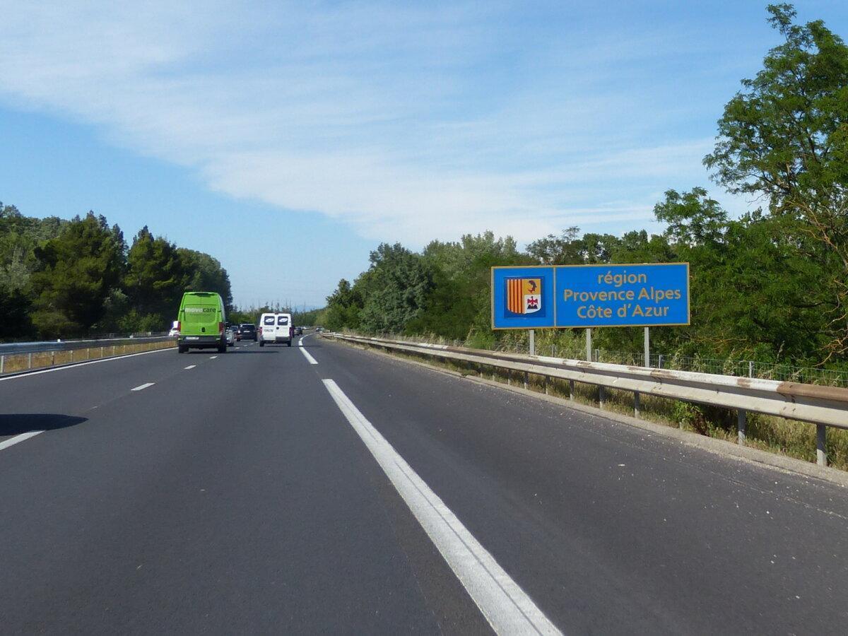 Autoroute A9 under bright light with Provence-Alpes-Côte d'Azur sign